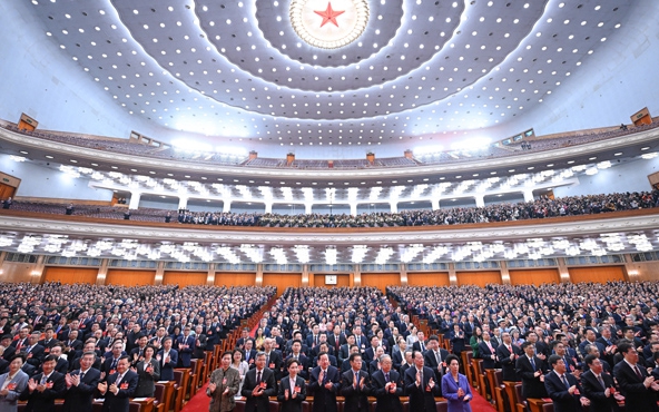 逐梦春天里 同心向未来——十四届全国人大三次会议闭幕侧记